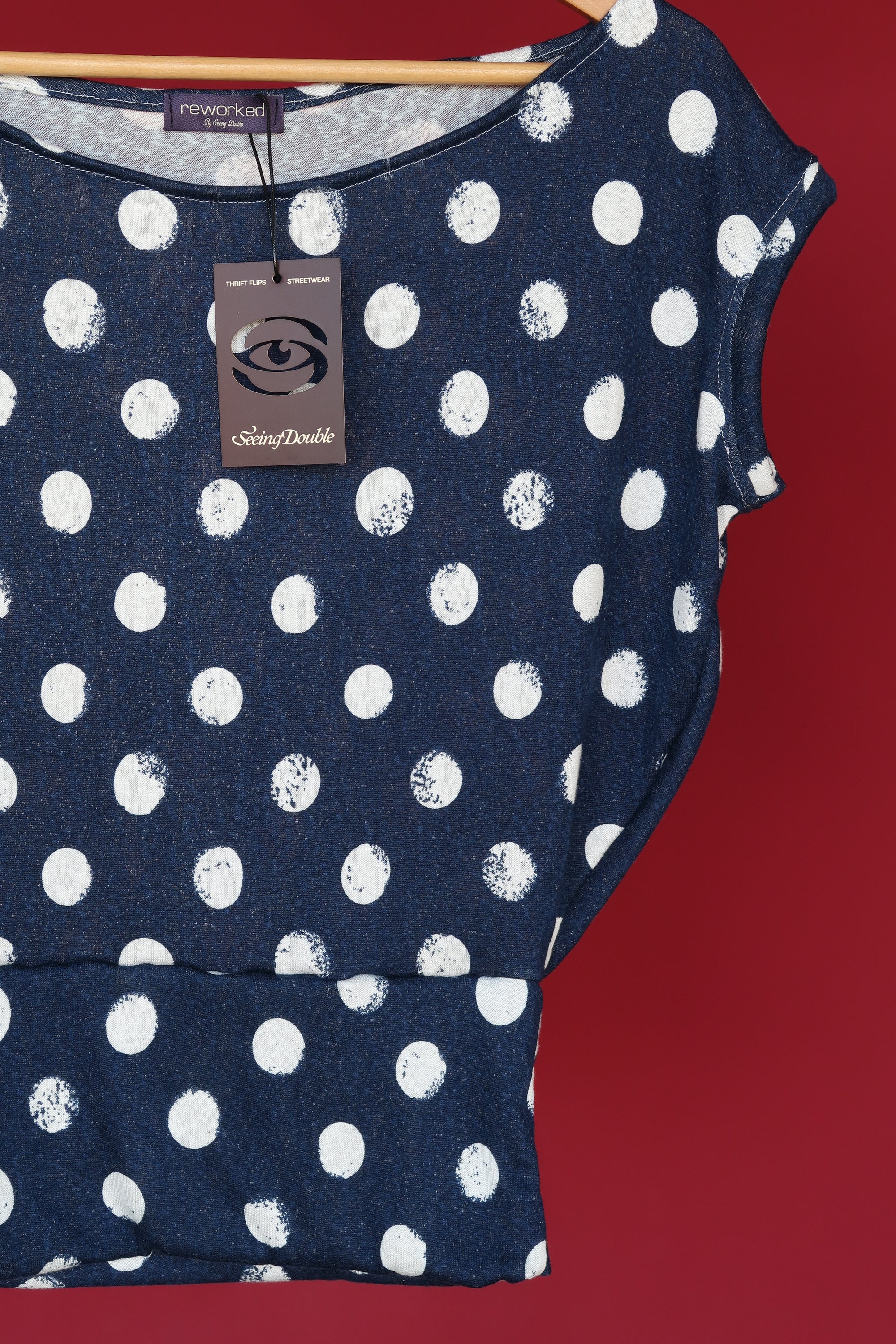 NAVY POLKA SLOUCH TOP